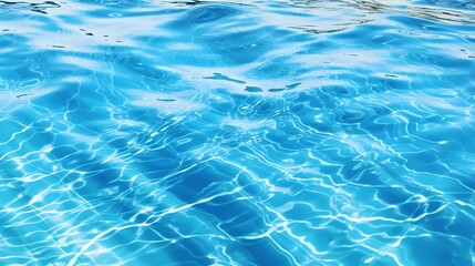 Crystal clear blue water reflecting sunlight beautifully.