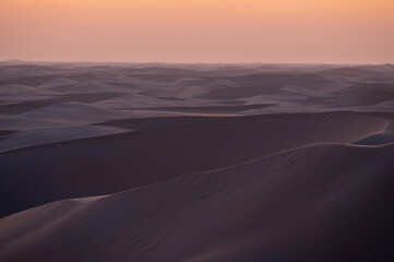 sunset sunrise with beautiful shadow cast on the desert sand dune