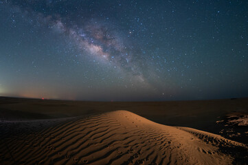 Night Stars milky way desert camping in lonely oasis