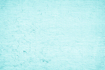 Grungy blue textured paper background with faded watercolor paint stains.