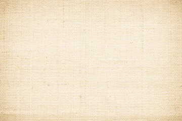 Closeup detail of beige fabric texture background. High resolution photo.
