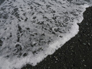 日本 小田原市御幸が浜海岸。自然が描くランダムな模様。Miyukigahama Beach, Odawara City, Japan. Random patterns drawn by nature.