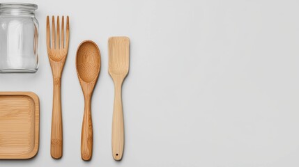 Zero Waste Concept: Eco-Friendly Bamboo Utensils and Glass Jar on White Background for Sustainable Living