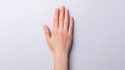 Close-Up of a Hand with Clear Skin on a Light Background Highlighting Healthy Skin and Nail Care