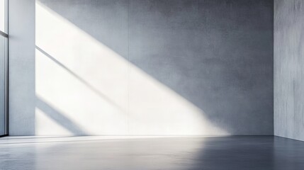 Minimalist living room with empty space and a grey wall.