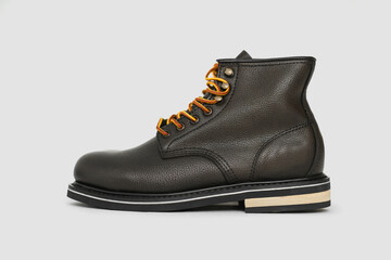 Brown leather boots on white background. Fashion