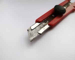 photo of small red cutter knife