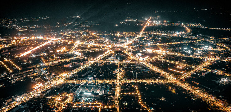 Night view of the octagon-shaped Tekes County from the air in Xinjiang, China 