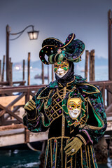 Venice, Italy - February 5, 2024: Pretty costume worn by a man during the carnival of Venice in...
