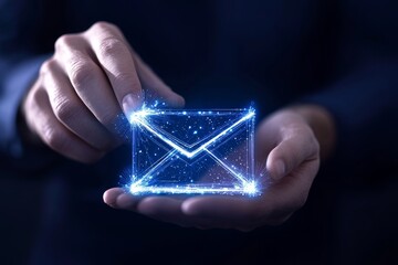 A glowing, digital envelope is held between two hands, symbolizing modern communication and technology.