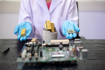 Technicians meticulously repair electronic components to turn them into precious gold. This process...