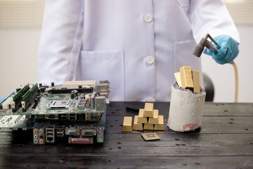 Technicians meticulously repair electronic components to turn them into precious gold. This process...