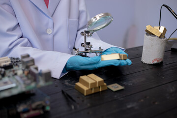 Technicians meticulously repair electronic components to turn them into precious gold. This process emphasizes advanced technical skills.