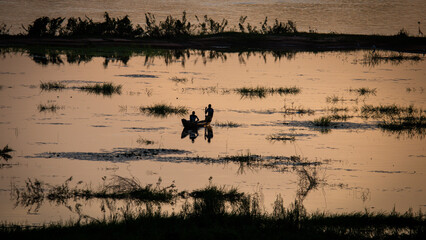 Boat on Niger River at Sunset