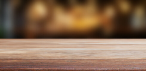 A smooth, warm restaurant background with an empty wooden tabletop, ideal for food-related designs and restaurant advertising