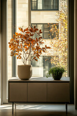 Stylish indoor arrangement with a potted plant and vibrant foliage by the window