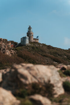 Kullen Lighthouse on a sunny day at Kullaberg Nature Reserve in Southern Sweden