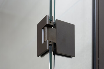 Close-Up of Modern Glass Door Hinge