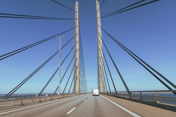 High-speed road bridge view from a fast-moving car.