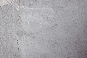 Plastered beige surface with cement material. Textured pattern with space for text. Texture of old gray concrete wall for background. Calm neutral spa background. 