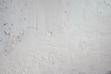 Plastered beige surface with cement material. Textured pattern with space for text. Texture of old gray concrete wall for background. Calm neutral spa background. 