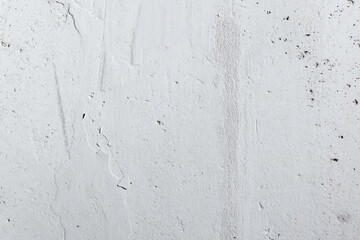 Plastered beige surface with cement material. Textured pattern with space for text. Texture of old gray concrete wall for background. Calm neutral spa background. 