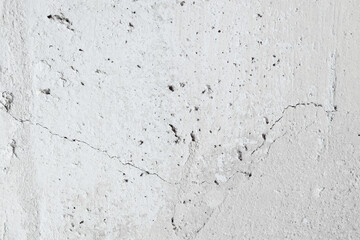 Plastered beige surface with cement material. Textured pattern with space for text. Texture of old gray concrete wall for background. Calm neutral spa background. 