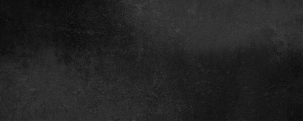 Rough and Matte Charcoal Wall Surface for Urban-Inspired Graphic Designs
