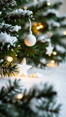 snowy evergreen branch with festive decorations
