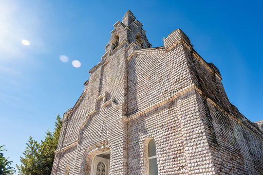 Church of San Sebastian covered in seashells on the island of La Toja, Galicia.