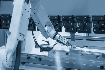 The high technology material handling at press brake bending machine by automatic robotic arm in...