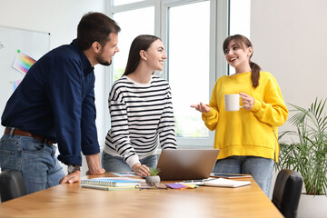 Fototapeta premium Group of designers working together in office