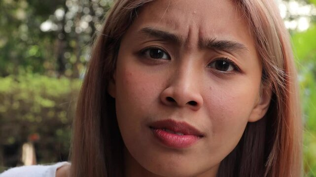 Confronting Emotions, Upset Woman with Intense Gaze Showing Anger