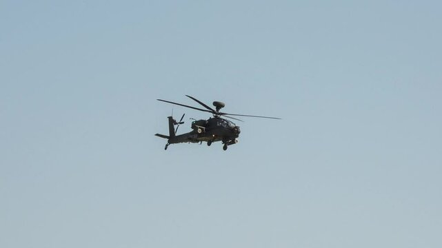 British army Boeing Apache Attack helicopter AH2 AH64E AH-64E Army Air Corps in low level flight, Wiltshire UK