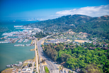 Outskirts and countryside of Sausalito and San Francisco on a sunny day, aerial view