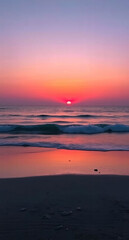 Fototapeta premium Pink sunset over the sea