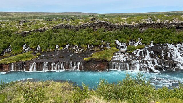 Hraunfossar waterfalls falling through lava in Iceland