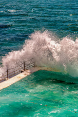 Bondi Beach, New South Wales. Sea Waves crushing on the famous pools along the ocean on a stormy...