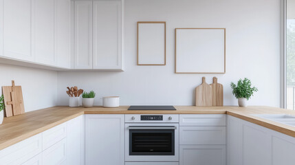 A modern kitchen featuring white cabinetry, wooden countertops, minimal decor, and open space with framed artwork ready to be filled.
