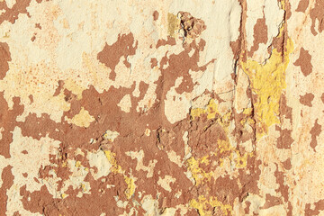 A fragment of a wall with red tints and yellow tint in the style of the 90s. Severe scratches and surface damage.