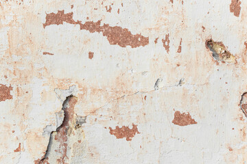 A fragment of a wall with red tints and yellow tint in the style of the 90s. Severe scratches and surface damage.