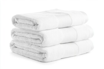 Set of clean white towels neatly folded, isolated on white background