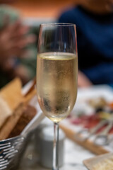 A glass of Prosecco or sparkling wine on the table