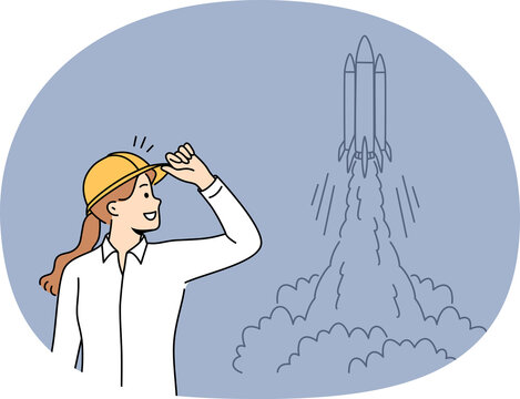 Woman engineer stands near taking off space rocket and watches successful takeoff of shuttle. Girl rejoices at launch of new spacecraft or rocket for research mission with astronauts landing on moon - Powered by Adobe