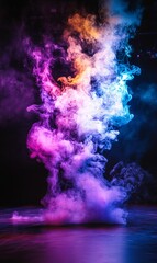 Naklejka premium Colorful smoke swirls against black background.