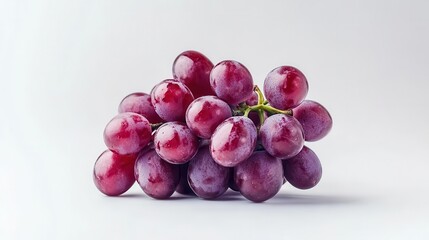 Fototapeta premium a fresh bunch of red grapes against a pure white background, emphasizing their rich color and texture, perfect for food photography and healthy lifestyle concepts
