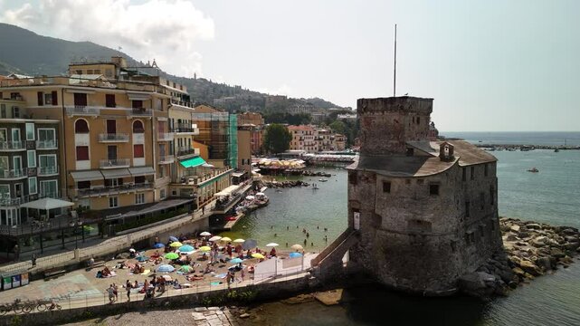 Exploring the stunning sights of Rapallo, Italy, with its historic tower and vibrant seaside life