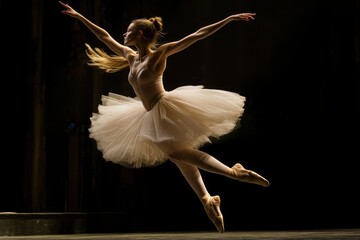 Graceful Dance Capturing the Elegance of a Ballerina in Motion Under Dramatic Lighting
