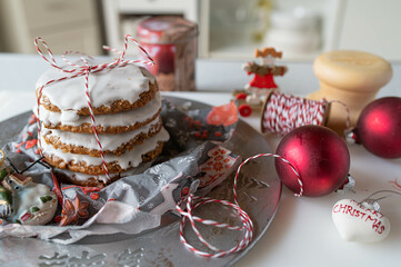 Fototapeta premium Homemade elisen gingerbread cookies traditional from germany with egg white glaze on kitchen counter