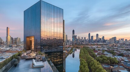 Fototapeta premium Modern Building Overlooking City at Sunset
